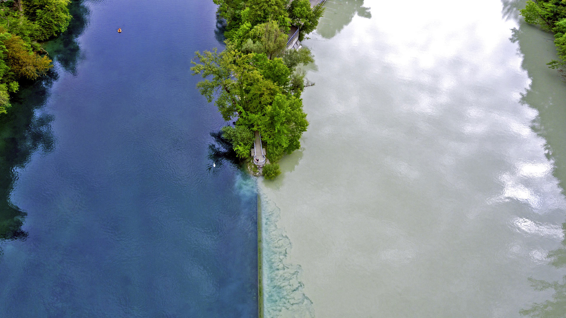 The Arve River (right) flowing into the Rhône in Geneva, Switzerland